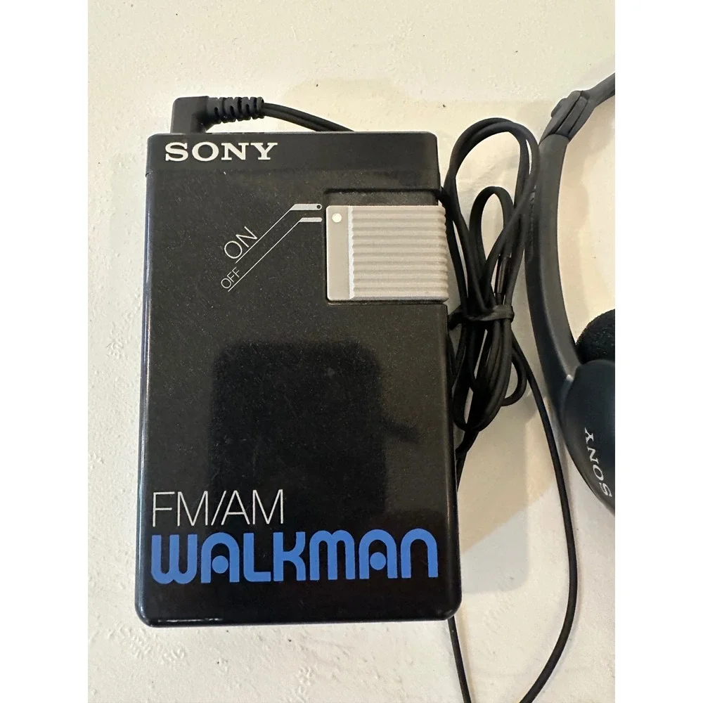 Sony SRF-21W FM AM Walkman Portable Radio Black with Sony MDR-A101 Headphones